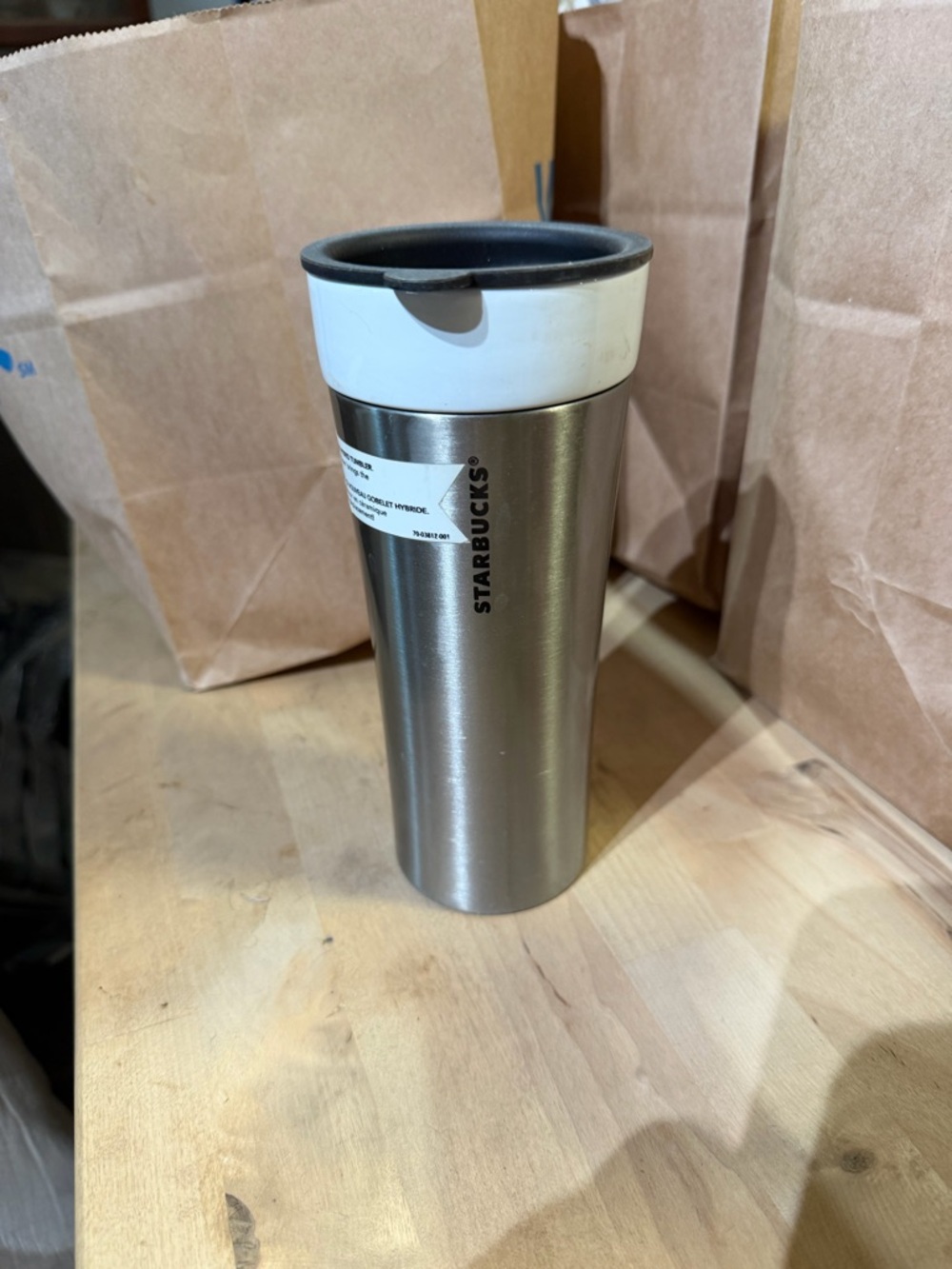 Starbucks Silver Travel Tumbler with White Lid and Black Rim